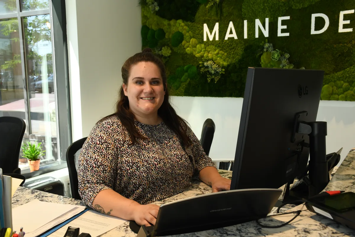 Maine Dentistry team member at the front desk