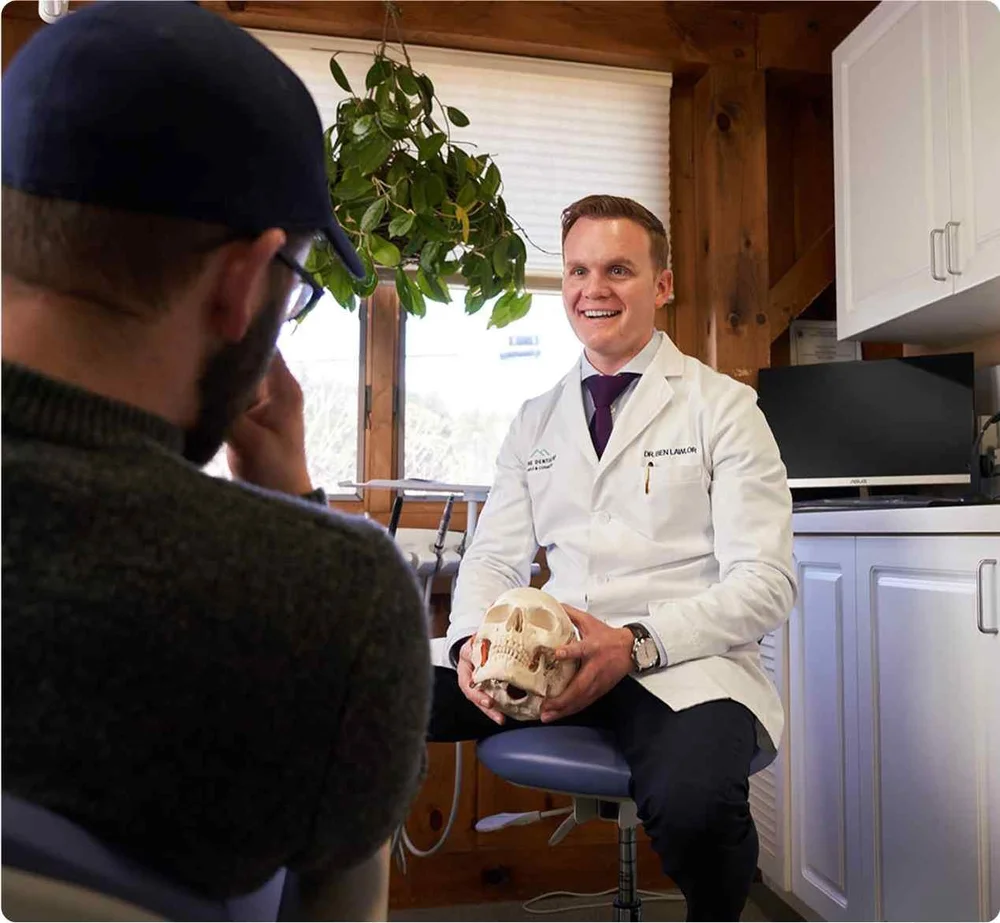 Dr. Benjamin Lawlor speaking with a patient during a consultation