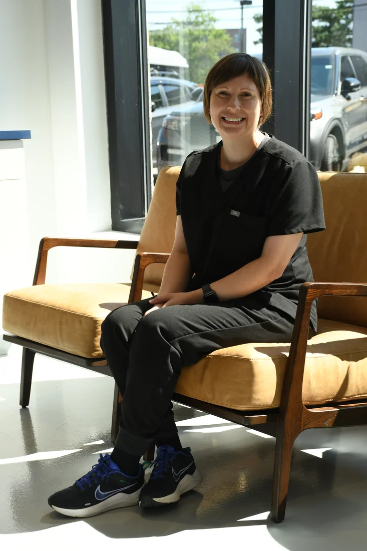 Maine Dentistry team member smiling in the waiting area